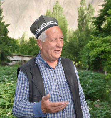 Azim Choragabov (65) in his garden in Pokhut village, Zerafshan valley, Northern Tajikistan.
