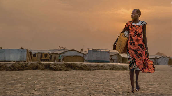 Coverfoto des Welthunger-Index 2018: Frau im Flüchtlingscamp Bentiu, Südsudan