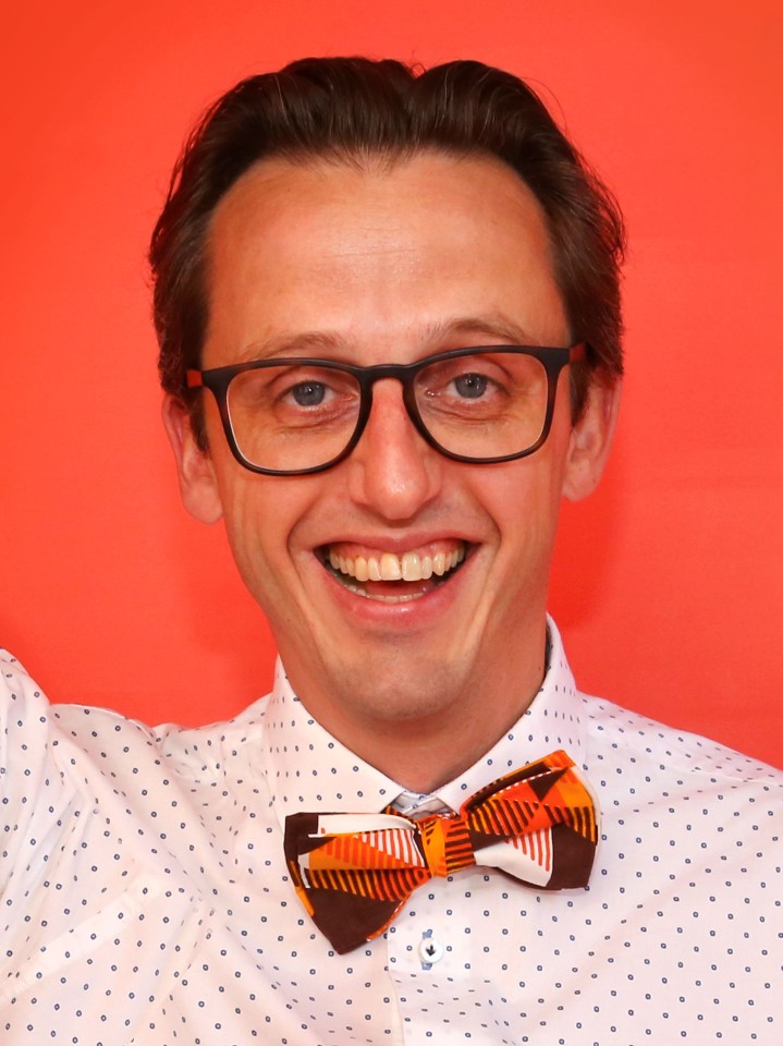 Portrait von einem lachenden Mann.